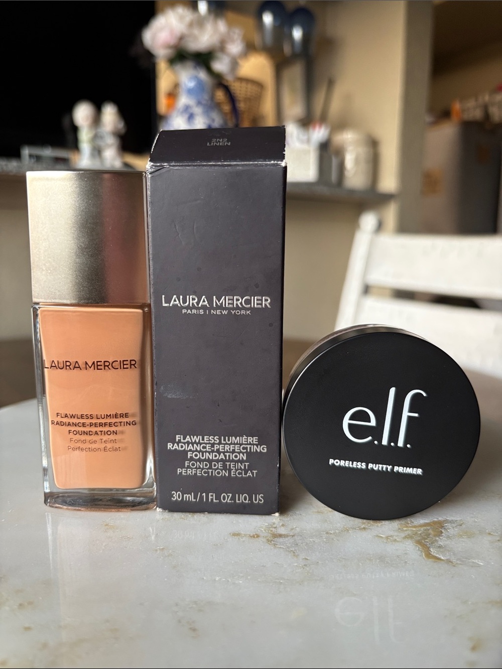 Laura Mercier Flawless Lumiere Radiance
Foundation + elf Poreless Putty Primer